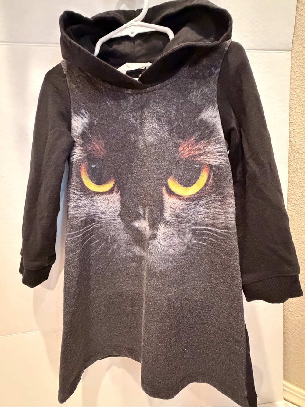 H&M Black Hooded Dress with Yellow Cat Eye Print